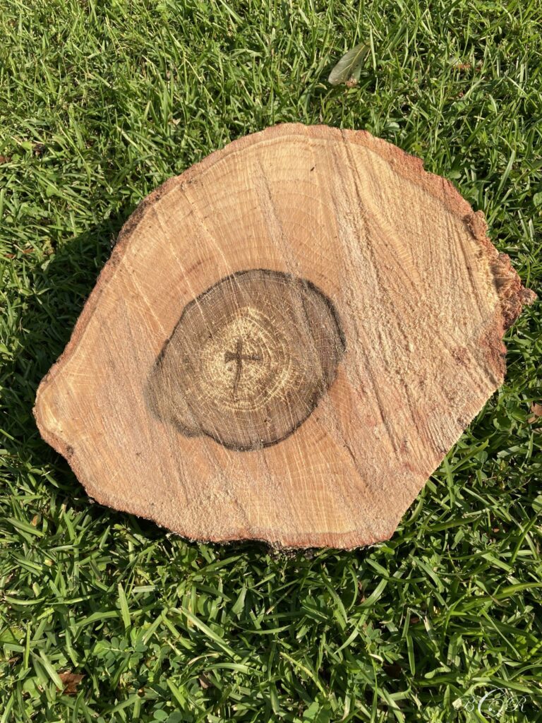 "This cross image was found in the center of a large branch taken from a rotten tree we had removed. 
It touched the life of the worker removing the tree. He was struggling to believe in God and I was able to use it as a witness to let him know God does exist and wants to be at the center of his life."
BRC